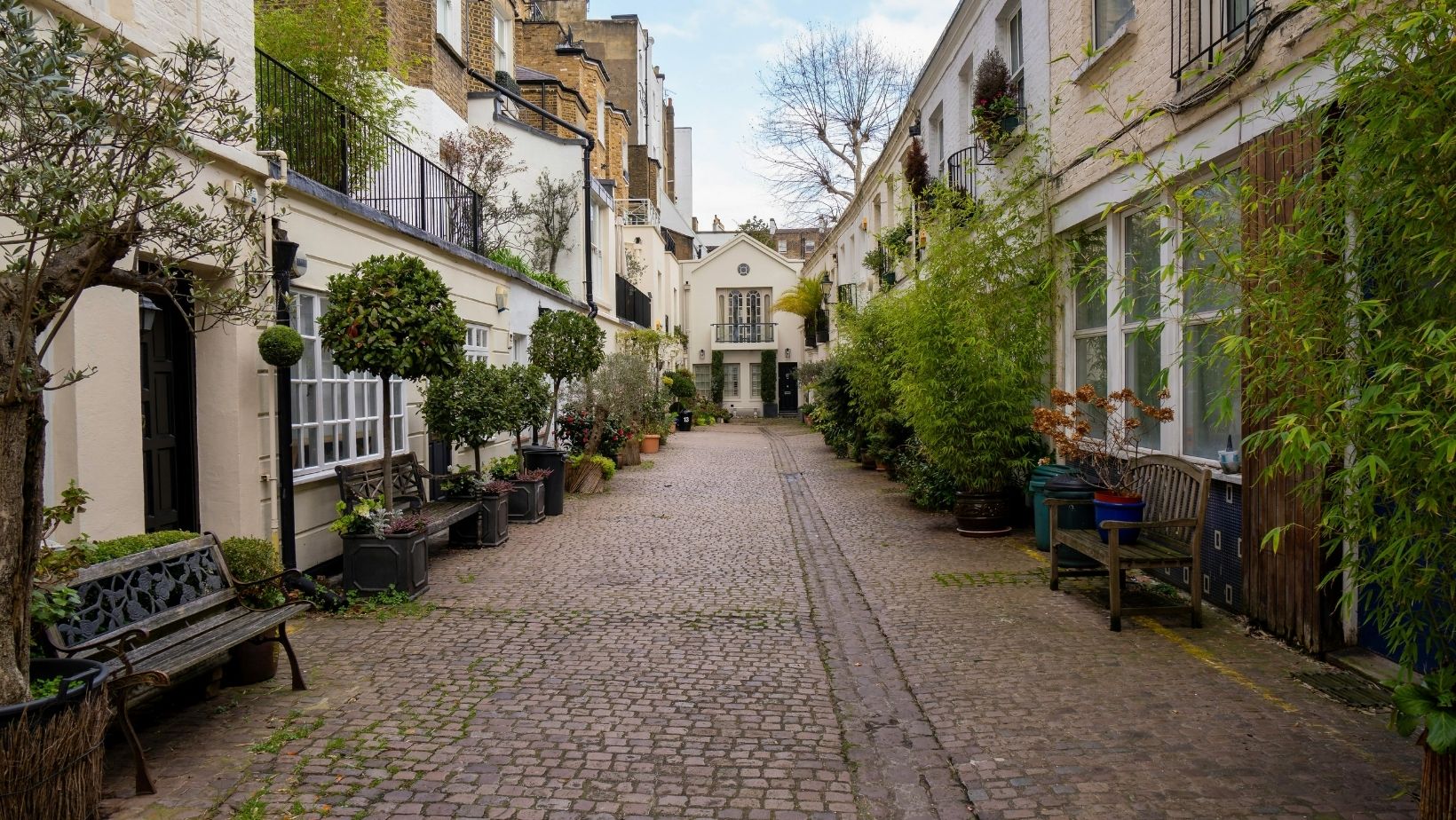 6 smart ways to use outdoor planters to elevate your homes decor and curb appeal