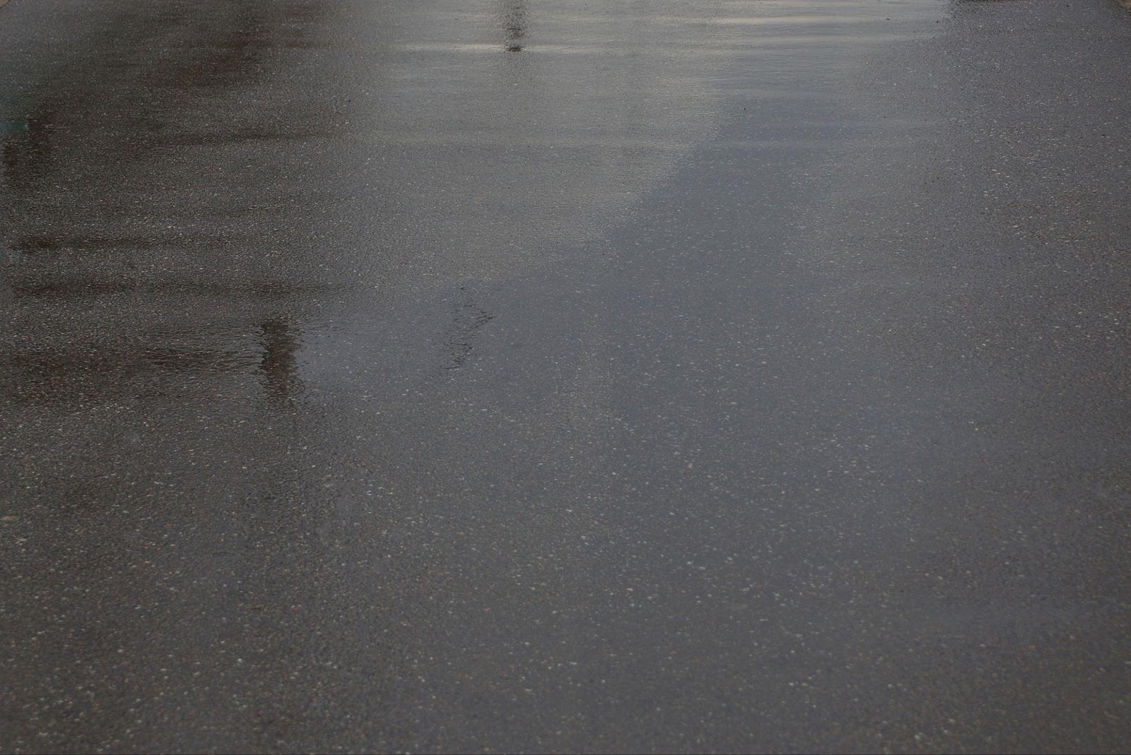 How economy paving uses reflective sealcoating to protect asphalt